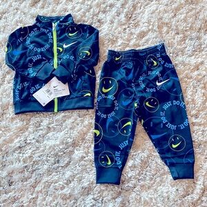 NWT Nike Boys 12 month blue and green matching zip up jacket and pants.